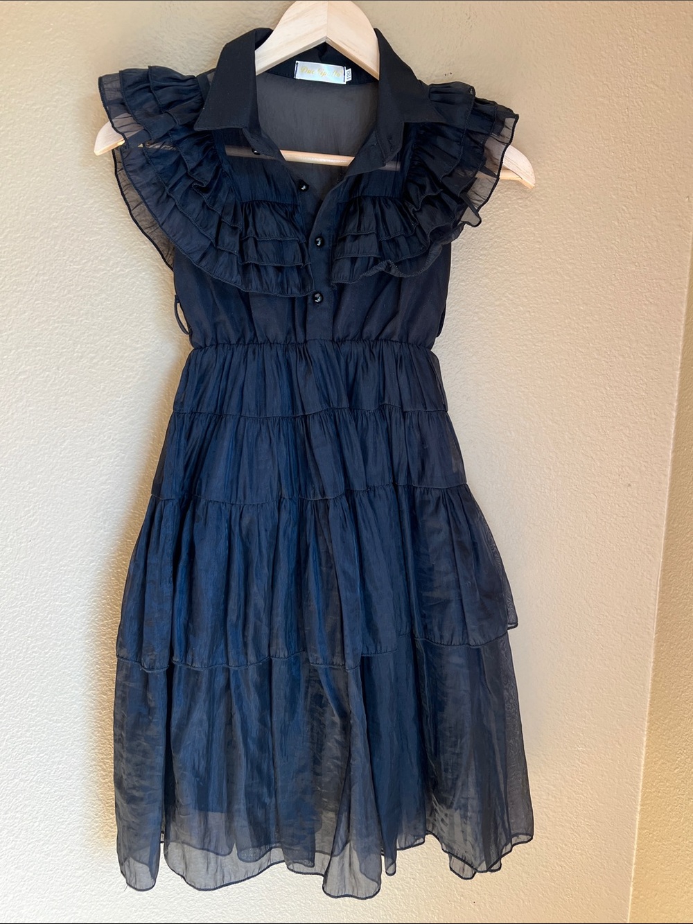 Black Duckipolla Child’s Dress 120 size is 5 or 6 US
Layers Ruffles Lined